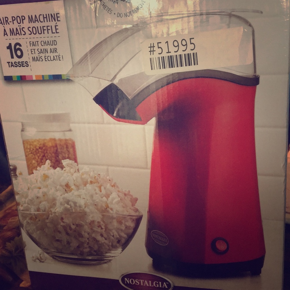 Red air-popper popcorn machine